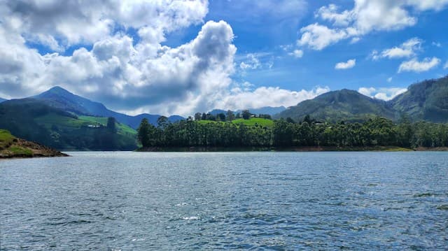 Mattupetty Dam surrounded by green hills