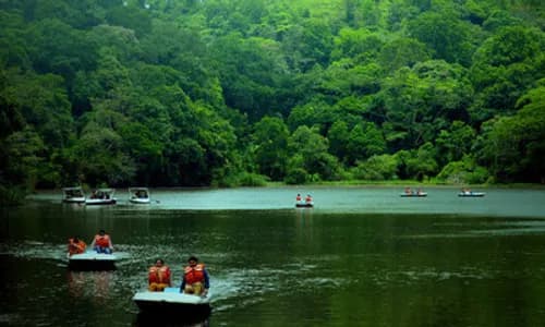 Lake surrounded by green hills